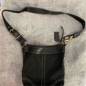 Authentic Coach legacy black leather bucket duffle shoulder bag.